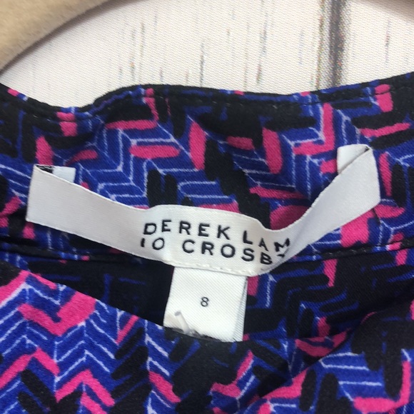 🌻 NWT Derek Lam IO Crosby 100% Silk Top
100% Silk - Picture 12 of 16